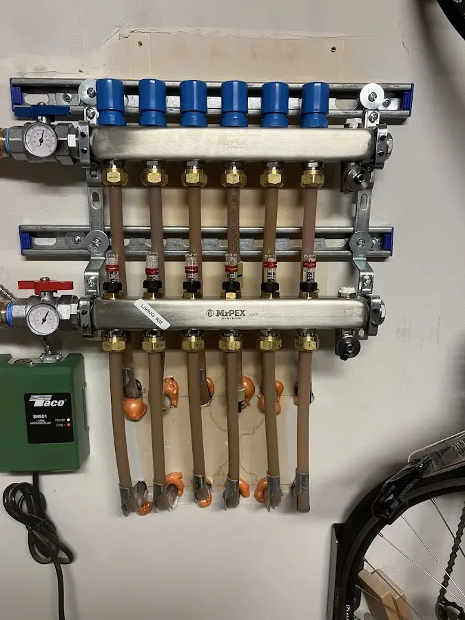 Plumber performing Water Heater Repair at a residential property in Winona