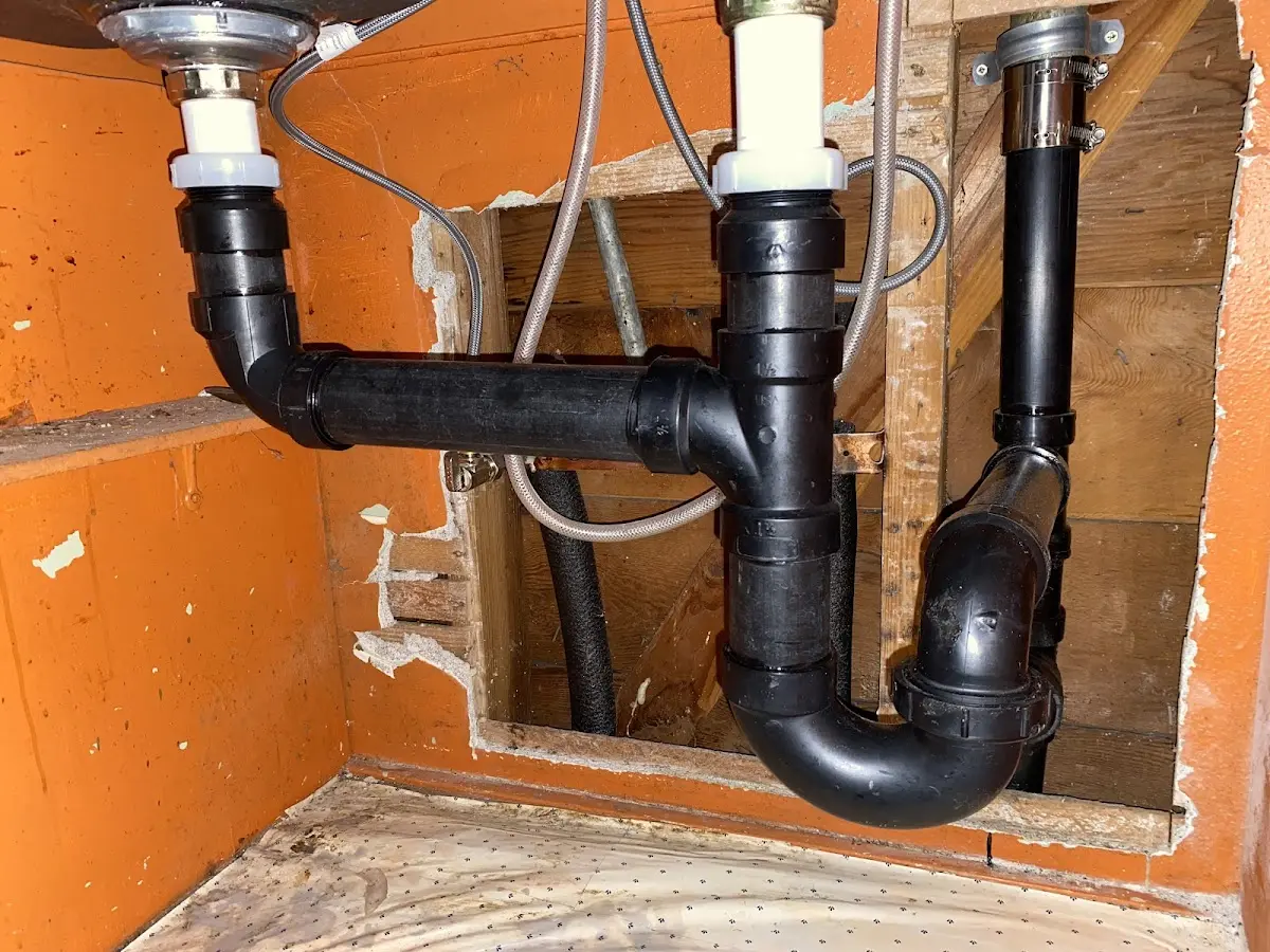 Professional Garbage Disposal Repair equipment and tools on the job in Winona